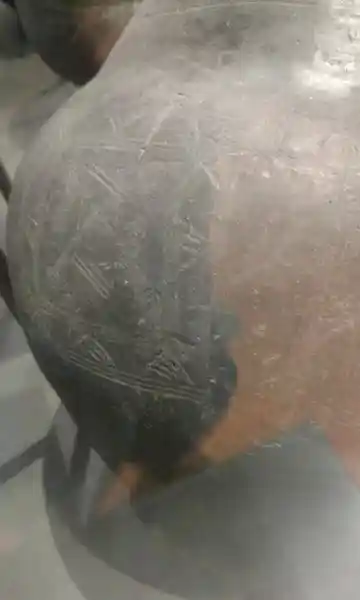 Vase, swastika cross inside a square